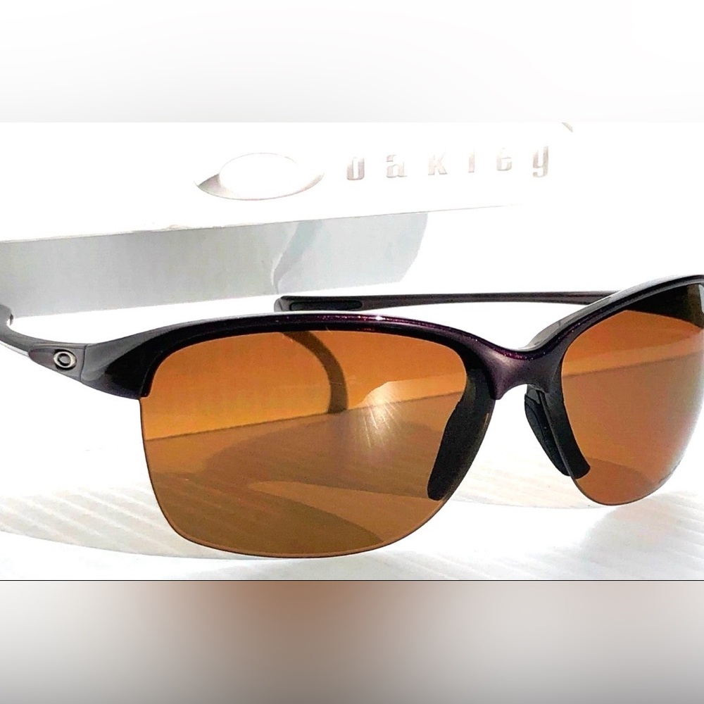 Oakley UNSTOPPABLE Raspberry Spritzer POLARIZED Brown Gradient Sunglasses 9191